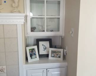 Built-in cabinetry matches kitchen cabinetry