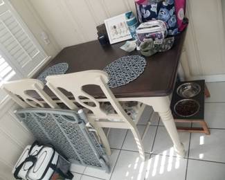 Dining table seats 4; 3 chairs available
