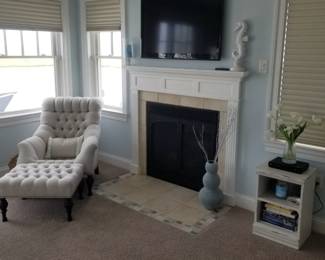 Flat screen TV with wall mount; fireplace mantel