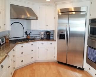 Kitchen is a U-shape layout - cabinets may be reconfigured