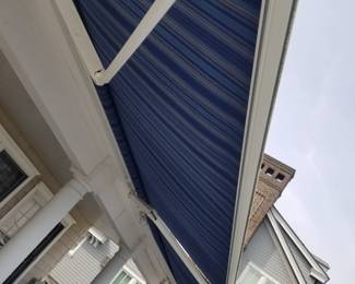 Two electric awnings with remote