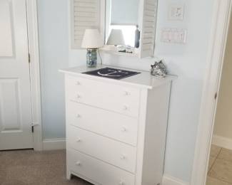 Cottage chic shuttered wall mirror; contemporary white dresser by young America