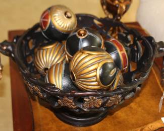 Bowl of decorative balls.