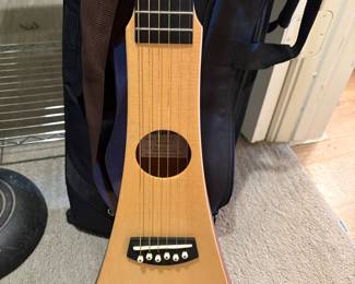 Martin Backpacker steel string acoustic guitar.
