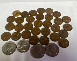 1 SACAGAWEA DOLLAR, 4 QUARTERS, 30 PENNIES