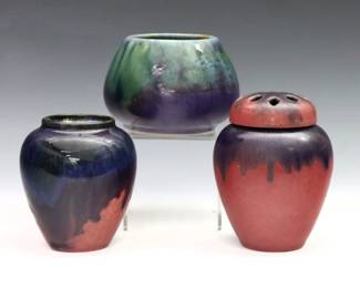 Three early 20th century Fulper Pottery vases. Ovoid and bulbous forms with multicolor drip glazes, one with flower frog cover. Printed "Fulper" marks. Slight crazing. Up to 4 1/2" high.