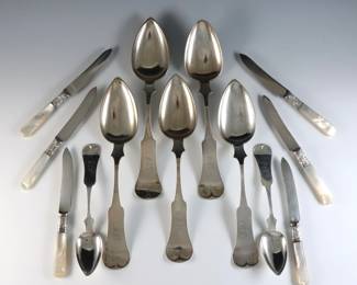 Thirteen pieces of American Coin and Silverplate flatware. Includes seven E. & D. Kinsey Coin Silver spoons and a set of six Landers, Frary & Clark fruit knives with Silverplate collars and Mother of Pearl handles. Stamped "E. & D. Kinsey" and "Landers, Frary & Clark / Aetna Works" marks. 11.04 troy ozs total, Coin Silver only. Some surface wear, fruit knives with minor damage, spoons monogrammed. Up to 8 3/4" long.