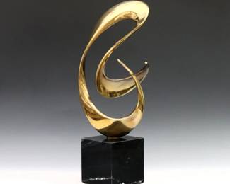 Bob Bennett, American, 1928-2003. A 1980's Bronze sculpture featuring a curving amorphic form presented on a Black Marble plinth. Signed "Bob Bennett" dated "88" and numbered "47/100" along sculpture edge. Minor surface wear. 16 1/2" high.