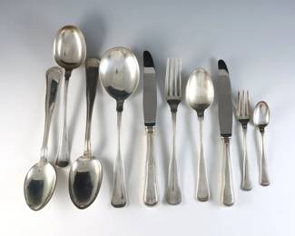 Ninety-nine pieces of Danish .826 to .830 Silver flatware. Various makers with a similar pattern. Each with impressed "830" marks or Danish "Three Towers" hallmarks denoting .826 Silver or higher. 90.50 troy ozs plus 30 hollow handles, approx. 105.50 total. Some wear. Up to 8 3/4" long.