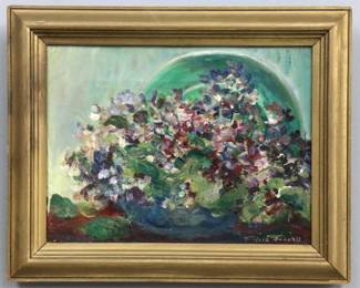 Theodora Makielski, American, 1890-1979. An early 20th century oil on canvas floral still life. Signed "Theodora Makielski" lower right, retains tag from "Makielski Art Shop" South Bend, IN at the stretcher verso. Some craquelure and flaking particular to lower left, minor surface grunge. Image 11 1/2 x 8 1/2" high, in molded wood frame with minor wear, 15 x 12" high overall.