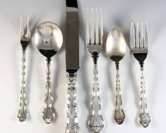 Forty pieces of Birks "Pompadour" pattern Sterling Silver flatware. Partial set, includes 6 x 8 1/2" hollow handle dinner knives, 4 x 7" dinner forks, 10 x 5 3/4" salad forks, 16 x 5 1/4" teaspoons, 3 x 5 3/4" soup spoons and a pickle fork. Impressed "Birks Sterling". 32.46 troy ozs plus 6 hollow handles, approx. 35.46 total. Minor surface wear.