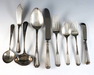 Forty-four pieces of Towle "Louis XIV" pattern Sterling Silver flatware. Features 8 five-piece place settings plus serving utensils. Includes 8 x 8 1/2" hollow handle dinner knives, 8 x 5 3/4" hollow handle butter knives, 8 x 7 1/8" dinner forks, 8 x 6 1/8" salad forks, 8 x 5 3/4" teaspoons, and 4 serving utensils. Stamped Towle maker's mark and "Sterling". 31.29 troy ozs plus 16 hollow handles, approx. 39.29 total. Some surface wear.