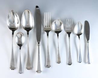 Sixty-six pieces of Wallace "Spanish Lace" pattern Sterling Silver flatware. Features 9 complete five-piece place settings plus additional flatware and serving utensils. Includes 12 x 9 1/8" hollow handle dinner knives, 12 x 6 5/8" hollow handle butter knives, 3 x 7" hollow handle master butter knives, 14 x 7 5/8" dinner forks, 9 x 6 5/8" salad forks, 11 x 6 1/4" teaspoons, 2 x 6 1/8" soup spoons and 1 x 8 1/2" serving spoon. Stamped "Wallace Sterling" and "Spanish Lace" marks. 45.43 troy ozs plus 29 hollow handles, approx. 61.41 total. Some surface wear.