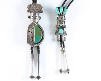 Two vintage Native American Sterling Silver bolo ties by Tony Chino and Alonzo Hustito. Both feature Kachina designs with bezel set Turquoise on braided leather ties. Larger signed "T. Chino / Sterling", smaller with "AH" maker's mark and "Bennet" clip, both sets of aiguillettes tested Sterling. 4.00 troy ozs total. Some wear. Clasps up to 3 3/4" high, up to 22" long overall.