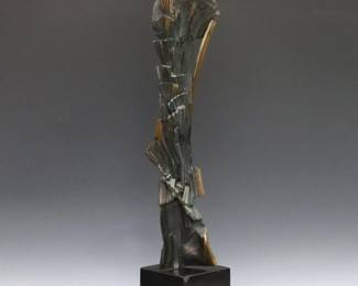 Glen Michaels, American, 1927-2020. A late 20th century Bronze abstract sculpture with patinated finish, presented on a polished Slate plinth. Signed "Glen Michaels" at sculpture back. Plinth with some surface wear and damage along edges. 26 1/2" high overall.