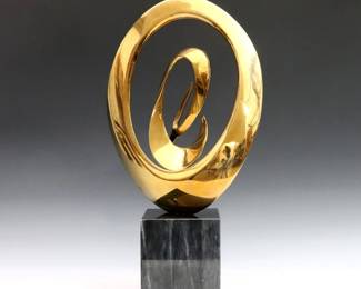 Bob Bennett, American, 1928-2003. A 1980's Bronze sculpture featuring a curving amorphic form presented on a Black Marble plinth. Signed "Bob Bennett" dated "88" and numbered "32/50" along sculpture edge. Minor surface wear. 15 1/2" high.