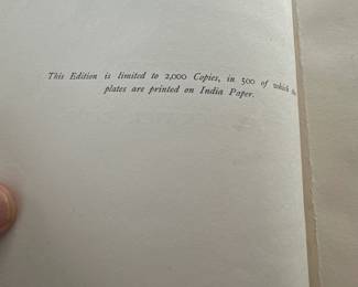 Another view of an antique illustrated 4-volume set of Pickwick Papers by Charles Dickens, published in 1887 by Chapman and Hall, London; inside pages attest "This edition is limited to 2,000 copies, in 500 of which the plates are printed on India paper."