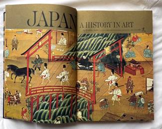 Inside pages of Japan: A History In Art by Bradley Smith, hardcover, 1964; #143 of 500 limited first edition signed copies; spectacular black silk brocade covers with gold woven medallions, bevelled edges - gold leaf patterned endpapers, signed by author Bradley Smith
