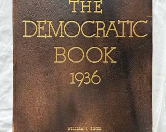 A rare copy of The Democratic Book 1936, in original gilt-lettered brown leather with the original pictorial wraps bound in; 384 pages. Signed by President Franklin Delano Roosevelt beneath a color image of the White House on the limitation leaf, #533 of an unstated limitation of 2500 copies. A voluminous book of information and advertising (many liquor ads) that was used as a fund raiser for the Democratic Party.