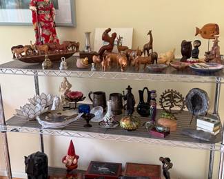 Japanese doll, carved wood animal figures from Africa, Native American Pottery, Geodes, and more!