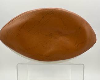 Another view of 1977 Notre Dame Team Signed Football - includes signatures from Coach Dan Devine, players including Joe Montana, Bob Golic, Vagas Ferguson, Rusty Lisch, Dave Wagmer, Kris Haines and many more. Appears to hold +50 signatures.