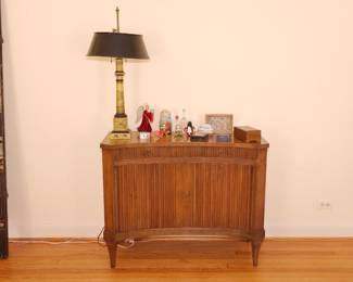 An elegant Baker Furniture Mid Century Modern curved front tambour doors fruitwood server