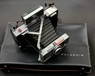 Another view of Polaroid Land Camera Automatic 100 camera and carrying case, user manual, accessories