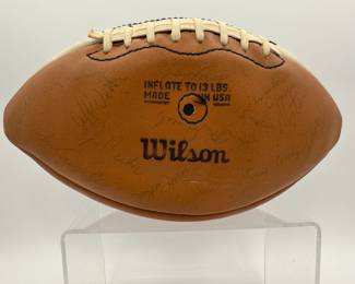 Another view of 1977 Notre Dame Team Signed Football - includes signatures from Coach Dan Devine, players including Joe Montana, Bob Golic, Vagas Ferguson, Rusty Lisch, Dave Wagmer, Kris Haines and many more. Appears to hold +50 signatures.