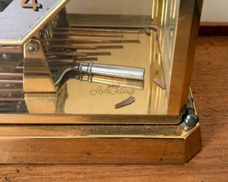 Closer look at Vintage Style King skeleton brass triple chime mantel clock made by Cuckoo Mfg C. Inc. Germany