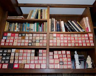 Extensive collection of player piano scrolls; Asian porcelain statuettes, books