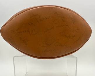 Another view of 1977 Notre Dame Team Signed Football - includes signatures from Coach Dan Devine, players including Joe Montana, Bob Golic, Vagas Ferguson, Rusty Lisch, Dave Wagmer, Kris Haines and many more. Appears to hold +50 signatures.