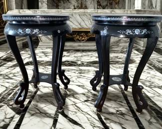 Lot 23: Pair of Asian Black Lacquer Mother-of-Pearl Pedestal Stands.
Height 23.5 x Width 17.5 inches. Table Top Diameter: 15 inches.