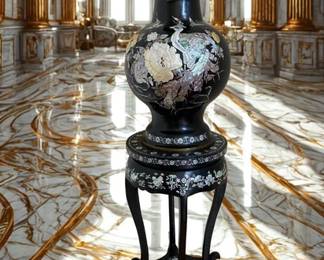 Lot 20: Asian Black Lacquer Mother-Of-Pearl Large Vase depicting peacock and small and large flowers. See close up separately.
Height 28 x Diameter 49 inches