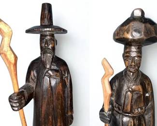 Lot 42: A Pair of Asian Wood Carved Figurines of Man and Lady Height 8.5 x Width 2.25 inches