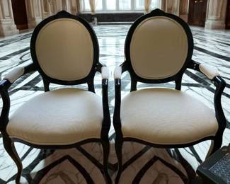 Lot 12: A Pair of Side Chairs. Black lacquer frame with neutral upholstery. CONDITION: Very good.