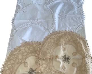 Lot 79: A Series of Round Beige and White Cotton Lace Pillow Shams. This lot includes: A Pair of Beige Pillow Shams: Diameter 21 inches A Pair of White Pillow Shams: Diameter 21 inches
Four White Pillow Shams: Diameter 19 inches CONDITION: Excellent