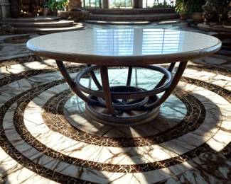 Lot 2: A Rattan Round Coffee Table with white faux marble top. Diameter: 37" x height 17".
CONDITION: Good commensurate with vintage age.
This rattan coffee table sold separately or as a 7-piece set. See other Rattan listings.