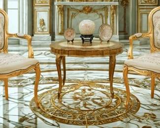 Lot 9: An Antique Pair of Tapestry Fabric Upholstered Gilt Chairs and Side Table Set.
Table: Width 31.5 x Depth 23 inches Each Chair: Width 25 x Depth 17 inches