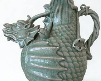 Lot 35: A Set of Five Asian Celadon Glazed Porcelain Articles