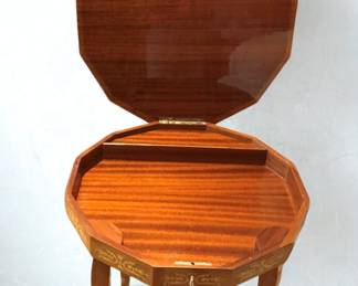 Lot 14: A Special Music Box Wood Side Table. Table top lid opens and plays music. Height 21.5 x Diameter 18.5 inches