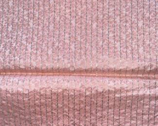 LOT 55: A stunning pink and metallic two-sided fabric. Each side has metallic but different pink pattern. 199 x 97 inches.