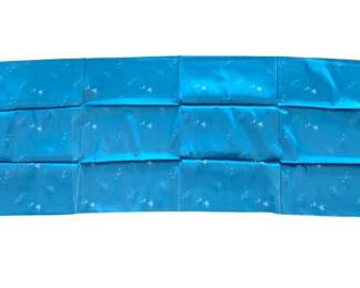 LOT 54: An Asian blue with light design silk fabric. 70 x 29 inches.