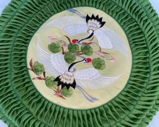Lot 46: A Pair of Asian Round Green Pillow Shams depicting Birds in Nature. Diameter: 16 inches.