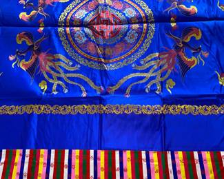 LOT 51: A stunning Korean silk royal blue finished article for use on bed, sofa, framed as artwork, decorative.
DIMENSIONS: 99 X 71 inches.