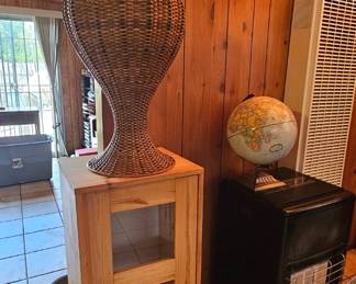 Large vintage rattan Mediterranean Style basket; indoor propane heater, storage cabinet.