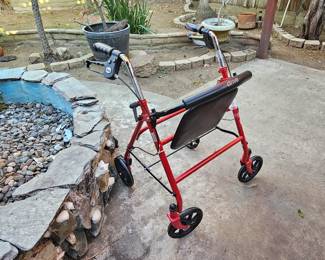 Drive Medical 4-wheel rollator walker.