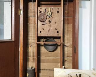 Riley Whiting wood works clock.