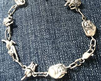 Frolicking cats bracelet sterling
