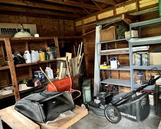 Outdoor shet - lawn mower, bathroom sinks, wheel barrow, and more
