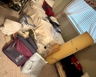 lots of sheets and blankets and pillows